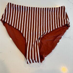 Coral Reef reversible swim bottoms. 12/14. New